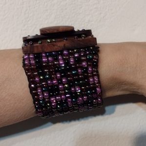 Bracelet wood clasp and beaded handcrafted beautiful purples iridescent beads